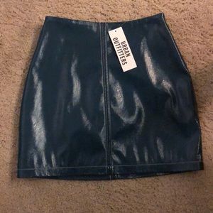 Beautiful trendy turquoise mini skirt
